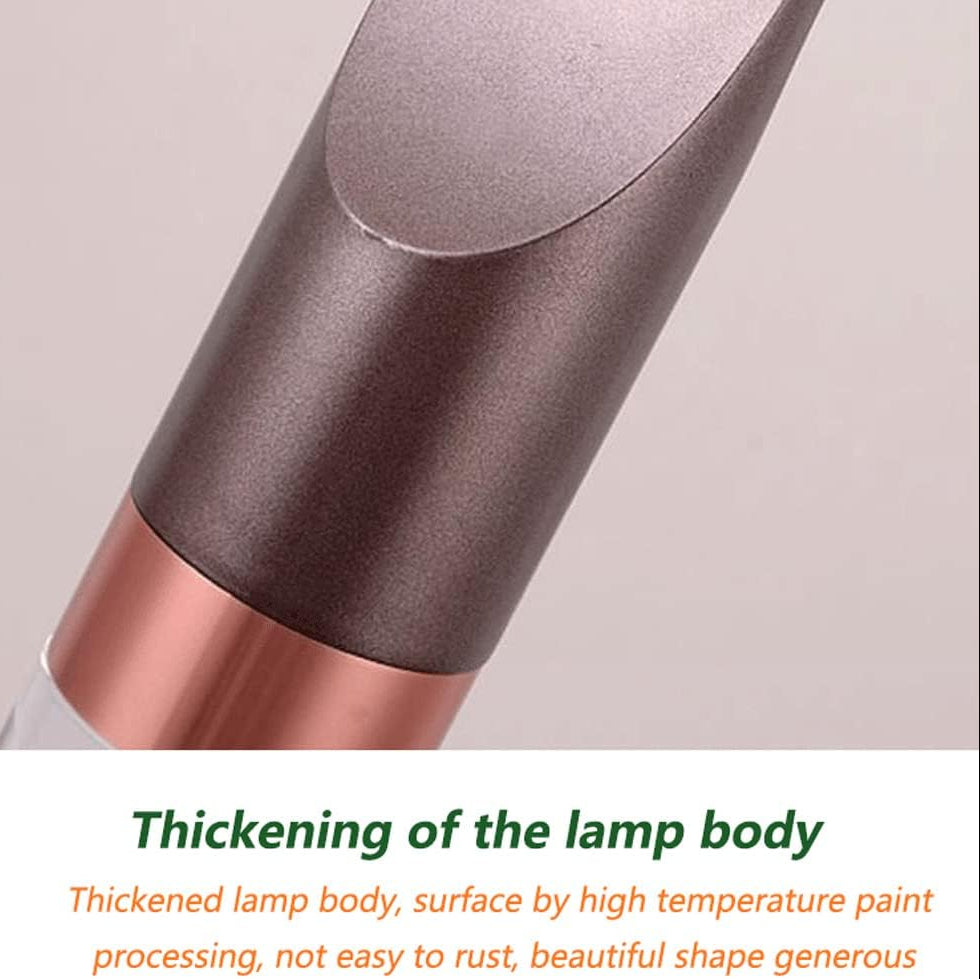 Close-up of a lamp body with text describing its thickening and surface treatment.